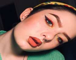 They have piercing in their ear and nose septum.